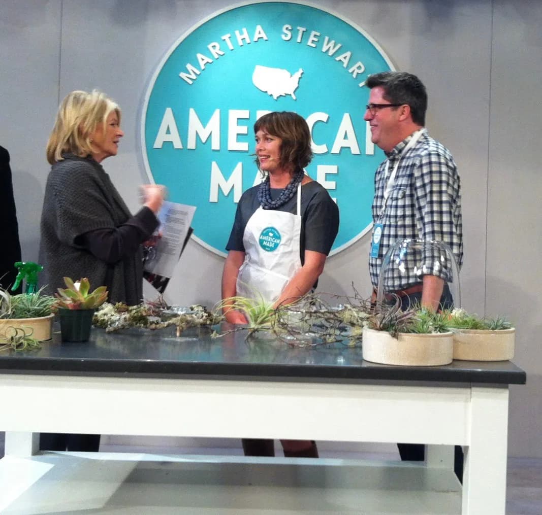 Martha Stewart and Flora Grubb talking on stage in front of the Martha Stewart American Made sign